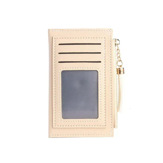 Lionel Handbags & Accessories- Cream Wristlet